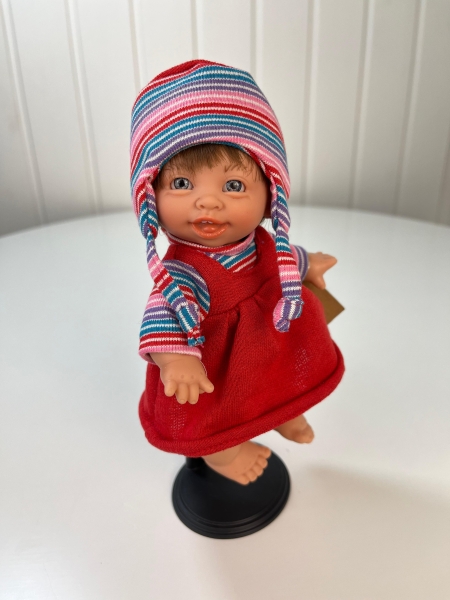 картинка испанские Кукла Джестито "Инфант", 18 см, в красном сарафане, улыбается, арт. 10000U-14 интернет-магазин TuKiTu.ru