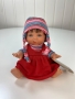 картинка испанские Кукла Джестито "Инфант", 18 см, в красном сарафане, ухмыляется, арт. 10000U-11 интернет-магазин TuKiTu.ru